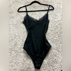 Black lace trim body suit